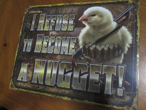Nugget metal sign measures 12 x 14 inches