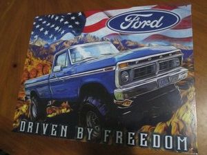 Ford metal sign measures 12 x 14 inches