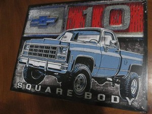 Chevrolet metal sign measures 12 x 14 inches