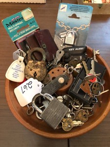 Wood bowl with vintage keys and locks