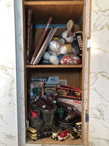 Hershey collectible figurines all in top cabinet