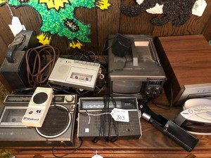 Radios, 8 track stereo, transceiver, microphone all on top
