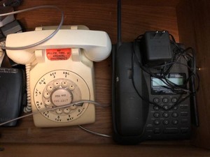 Telephones and Sony Walkman all in drawer
