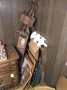 Wood shelves, pictures and frames