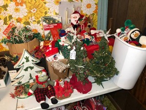 Large assortment of Christmas all on top of table