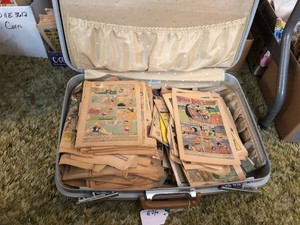 Suitcase full of comic books, all missing covers