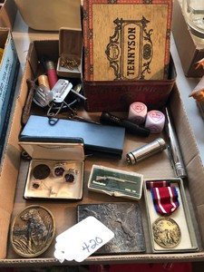 Remington tie tack, tins, belt buckles, military pins