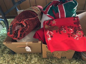 Christmas pinecones, styrofoam cut outs, table cloths 2 boxes of