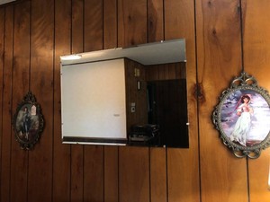 Wall mirror with Victorian pictures