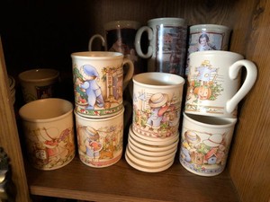 Watkins plates, baking dishes and mugs all on shelf