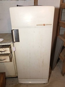 Vintage General Electric refrigerator LOCATED IN BASEMENT