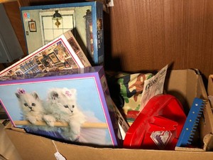 Collection of games, puzzles and weaving loom
