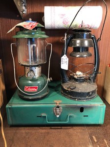 Coleman lantern, camping stove and oil lamp