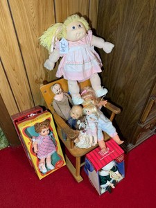 Dolls and childrens rocking chair with music notes