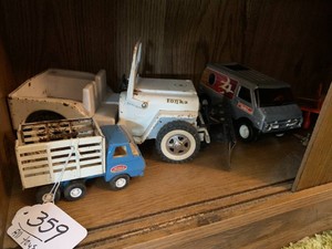 Toys - Tonka, Reeses airplane and others all on shelf