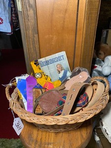Boy Scouts, McLeod County Fair ribbons, leather craft items all in basket