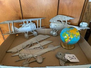 Sexton metal wall hanger airplanes and metal world J. Chein bank