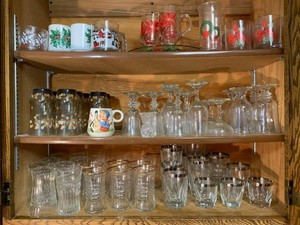 Stemware, water glasses, Christmas glasses all in cupboard