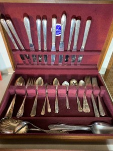 Silverware, not all matching with chest
