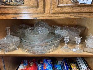 Clear glassware - platters, bowls, candle holders all on top shelf