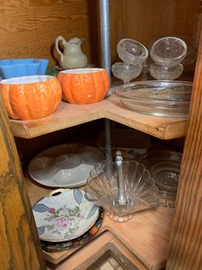 Frankhoma, string holder, Red Wing relish platter, clear glassware all in corner lazy susan cupboard