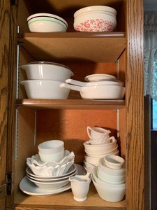 White glassware and dishes - Fire King, Corningware, Syracuse China all in cupboard