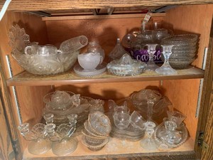 Clear glassware - bowls, snack trays, candle holders and more some vintage all in cupboard
