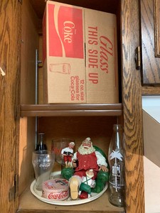 Coca- Cola advertising all in cupboard