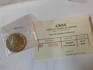 Gold electric plate 1983 Kennedy half dollar