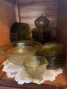 Yellow depression glassware, not all matching all in 2 cupboards