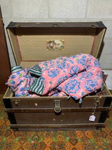Flat top trunks with quilts LOCATED IN BASEMENT