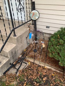 Metal garden art and plant stands