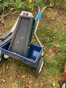 Red Devil lawn spreader and (4) splash blocks