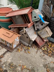 Wood and plastic birdhouses and feeders