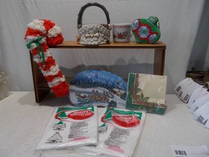 Assorted Holiday Decor and Storage Lot with Ceramic Santa Basket and Tree Bags
