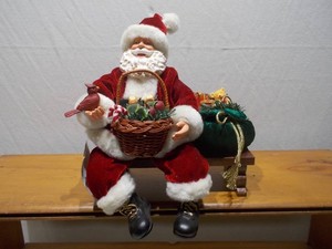 Vintage Seated Santa Claus Figurine with Cardinal & Gift Sack
