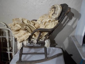 Vintage-Style Doll in Wooden Rocking Chair