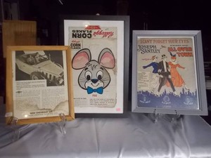 Framed Chuck E. Cheese and The Glenn Miller Story Posters