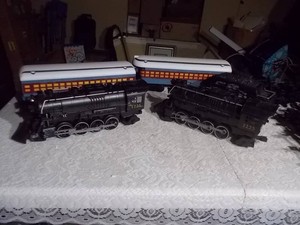 Model Train Set with Locomotive and Passenger Cars
