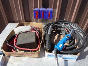 Wire feed welder, stingers & battery cables. As shown.