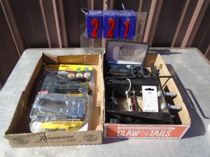 Grand Casino coins & staplers. As shown.