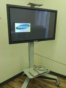 50 SAMSUNG TV (PLASMA DISPLAY) ON ERGOTRON STANDING ROLLING CORNER CART