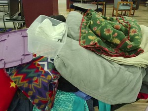 3 BOXES OF CLOTHING - COATS  AND BLANKETS AND MORE