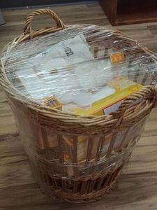WICKER BASKET FULL OF TONS OF NEW VINYL GLOVES