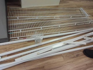3 COATED METAL SHELVES WITH WALL RACKING AND BRACKETS BY RUBBERMAID