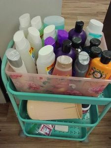 CUTE GREEN CART FULL OF BRAND NEW SHAMPOOS AND CONDITIONS (HUGE AMOUNT)