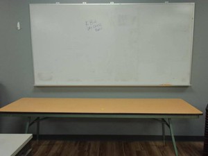 LARGE RECTANGULAR TABLE AND LARGE WHITE BOARD