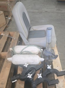 boating accessory lot a seat pedestal buoys and some fishing rod holders