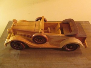 Vintage carved wood retro style convertible car