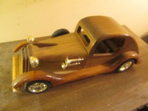 Vintage carved wood retro style hardtop car